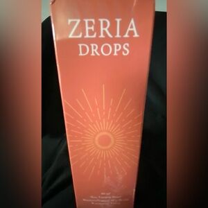 Zeria Drops in Orange Packaging for Tanning